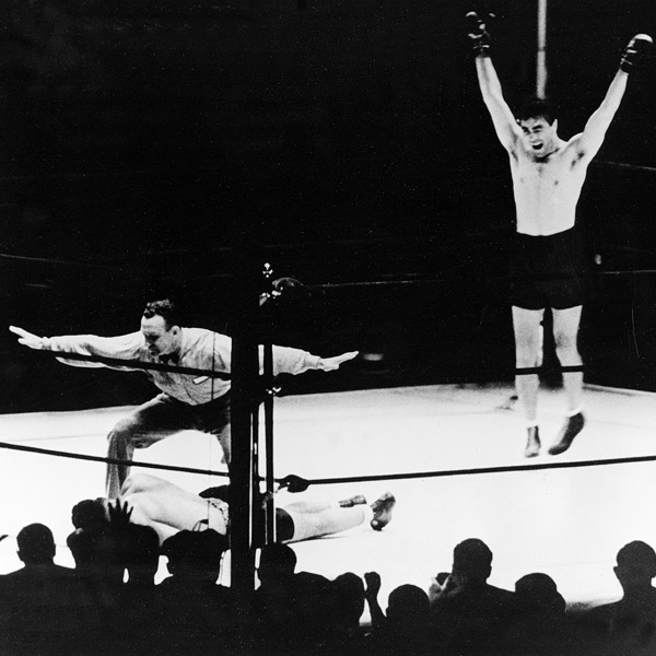 Max Schmeling knocking out Joe Louis in 1936 (Click Photot To View FIght Clip)