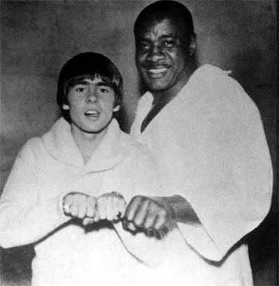 Davey Jones of The Monkees with Former Champ Sonny Liston (Click Photo to View Movie Clip of the m boxing in the movie HEAD)