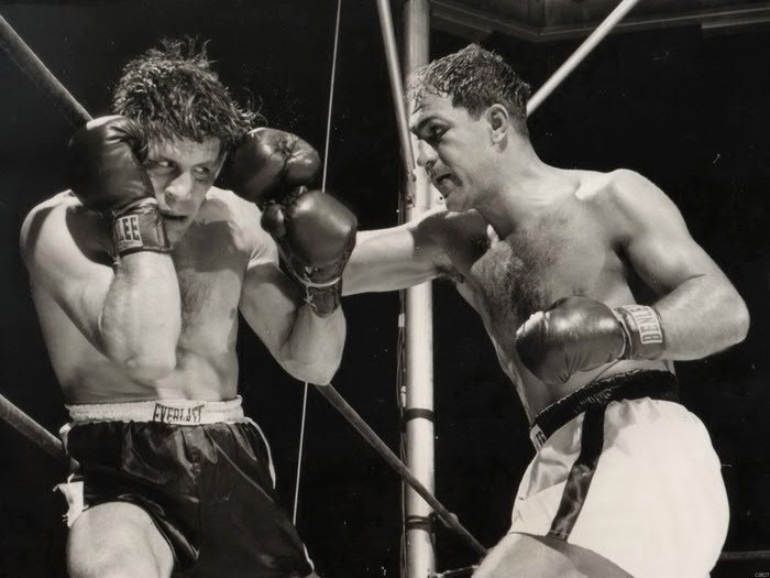Rocky Marciano (R) attacking challenger Roland La Starza (L) in their 1953 Heavyweight Championship Battle