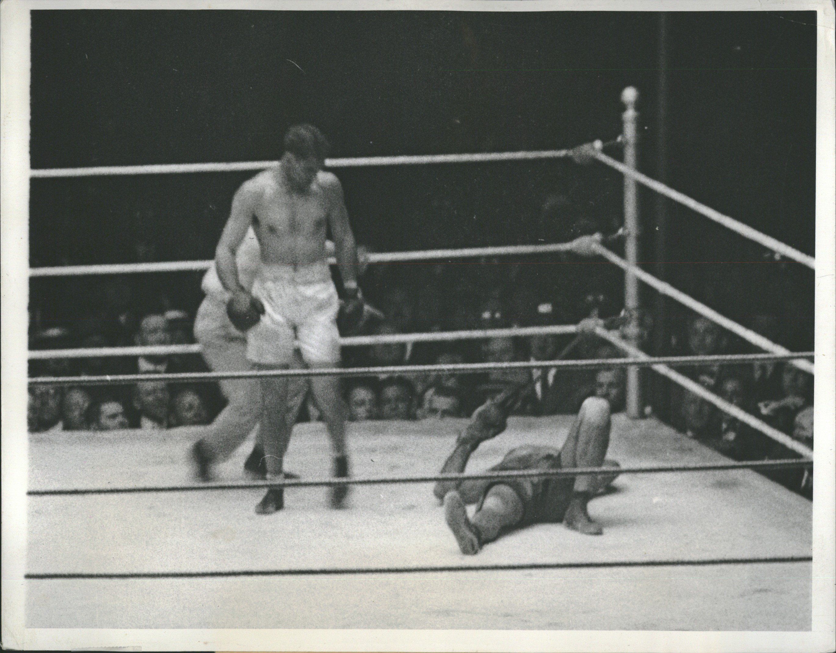 Jack Dempsey knocks at Challenger Luis Angel Firpo in 1923 (CLICK ON PHOTO TO VIEW FIGHT CLIP)