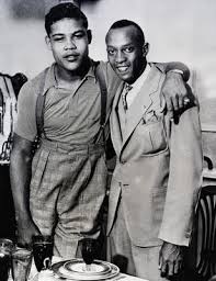 Joe Louis (L) with Olympic Track Champion Jesse Owens (R) in 1936