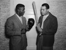 Jackie Robinson (L) with Joe Louis (R) in 1948