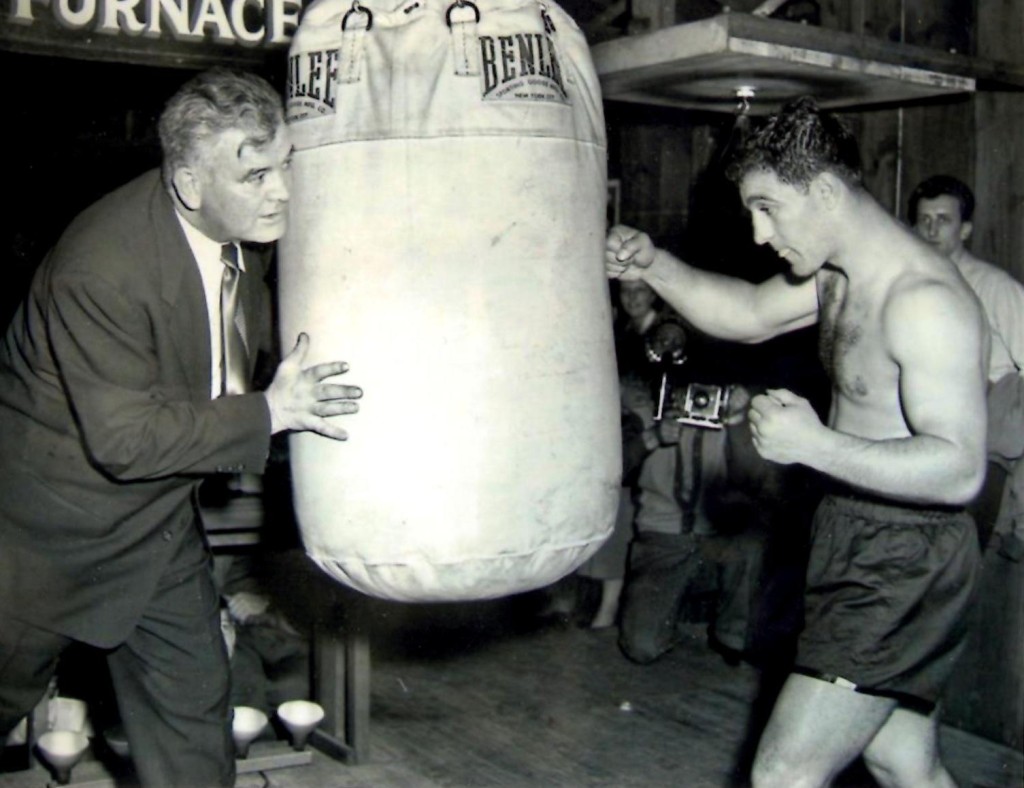 Former Heavyweight Champion James J. Braddock with heavyweight Challenger Rocky Marciano in training