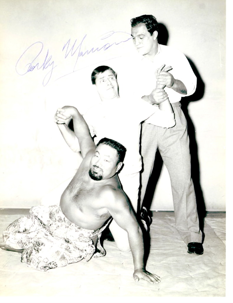 Jerry Lewis with a wrestler and Rocky Marciano