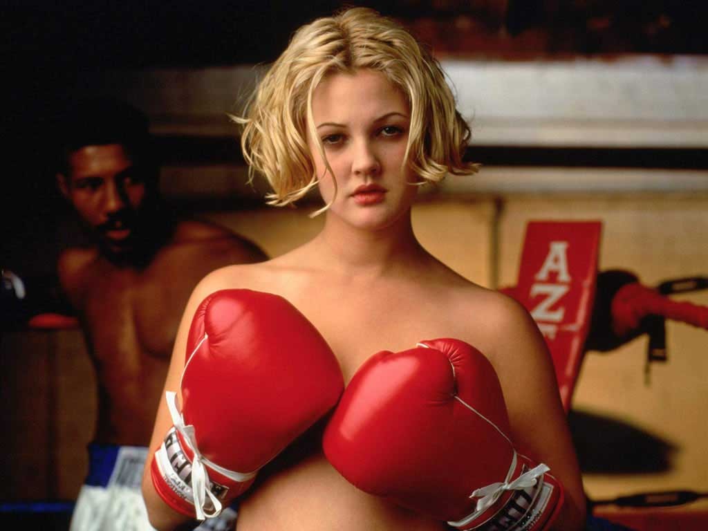 Actress Drew Barrymore strikes a boxing poses