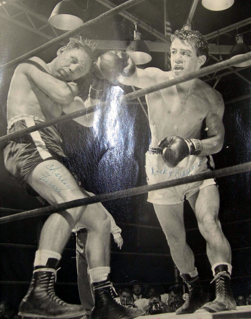 Charlie Fusari (L) and Rocky Graziano (R) battle each other