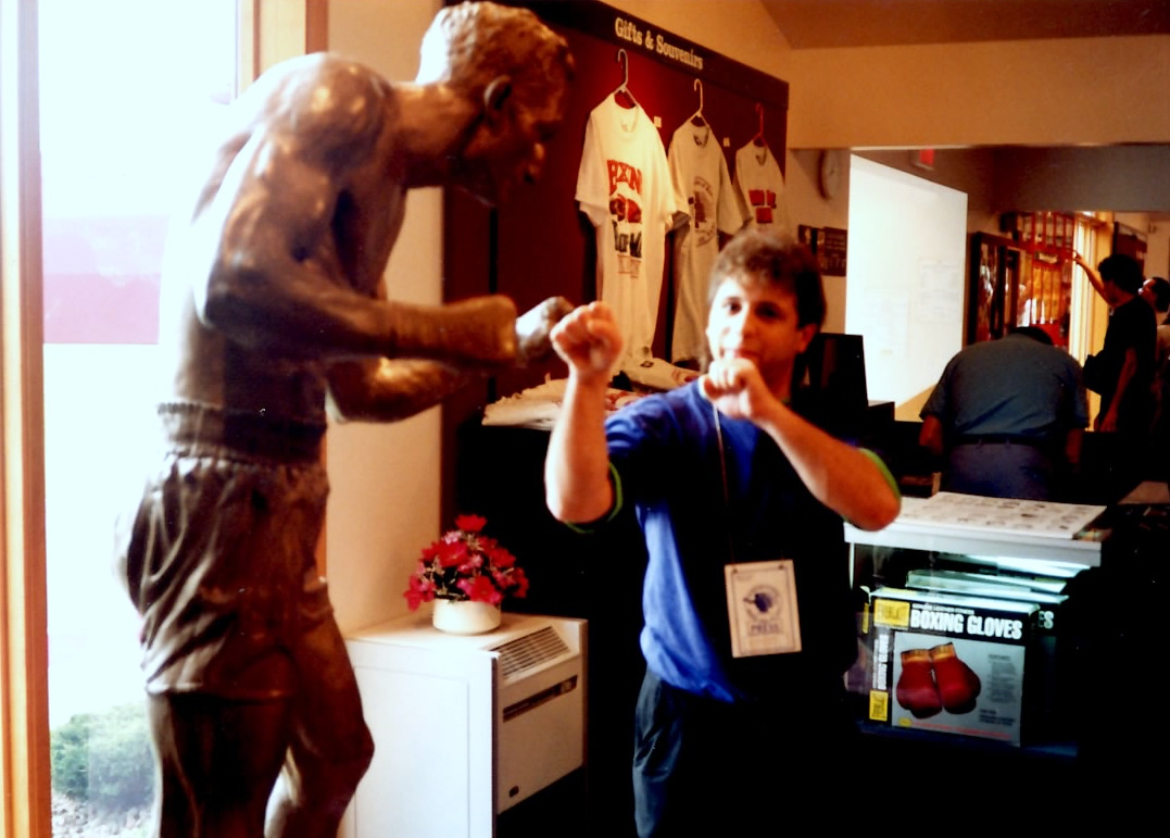 Gerard squaring off with a statue of Carmen Basilio at the Boxing Hall of Fame