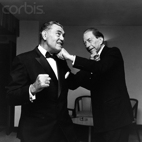 1967 --- The American oil executive, multi-millionaire and art collector, Jean Paul Getty I (r), pretends to box with the former heavyweight champion, Jack Dempsey, 1967. --- Image by © Hulton-Deutsch Collection/CORBIS