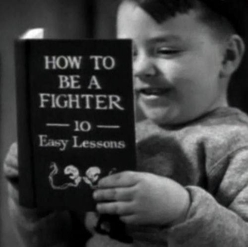 Spanky with boxing book.