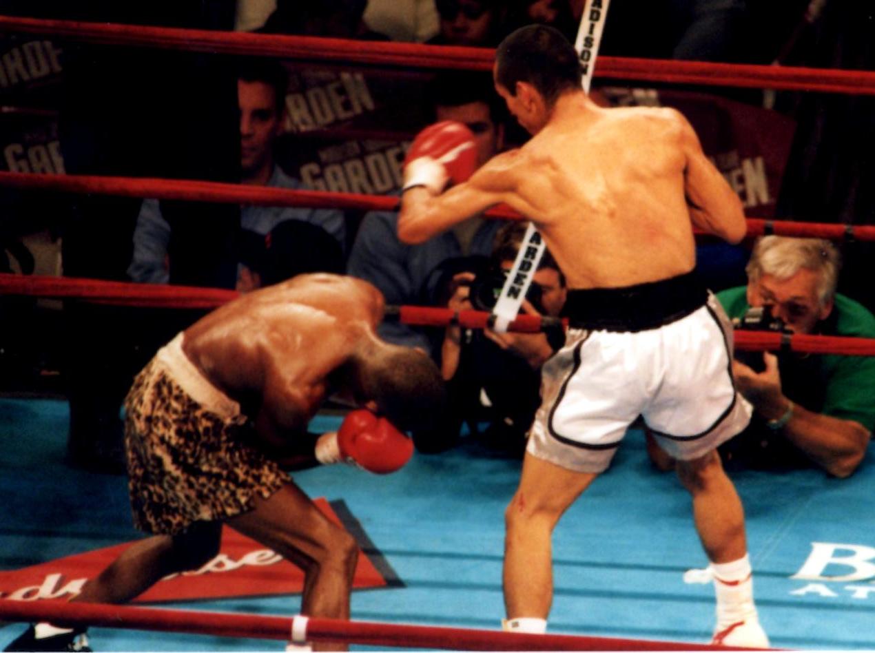  Ricardo Lopez (R) banging away at challenger Zolani Petelo (L) in defense of his IBF Light Flyweight Title on September 29, 2001, in New York's Madison Square Garden (PHOTO BY ALEX RINALDI)