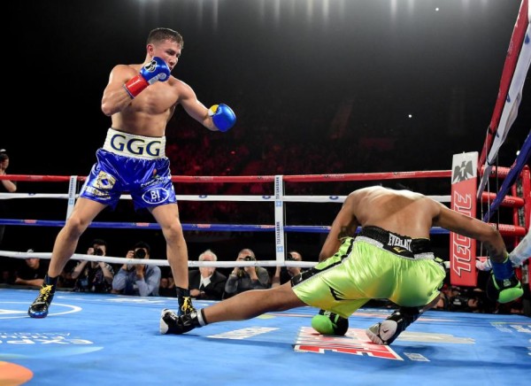 INGLEWOOD, CA - APRIL 23: Gennady Golovkin of Kazakhstan knocks down Dominc Wade for the second time on way to a second round TKO during his unified middleweight title fight at The Forum on April 23, 2016 in Inglewood, California. (Photo by Harry How/Getty Images)