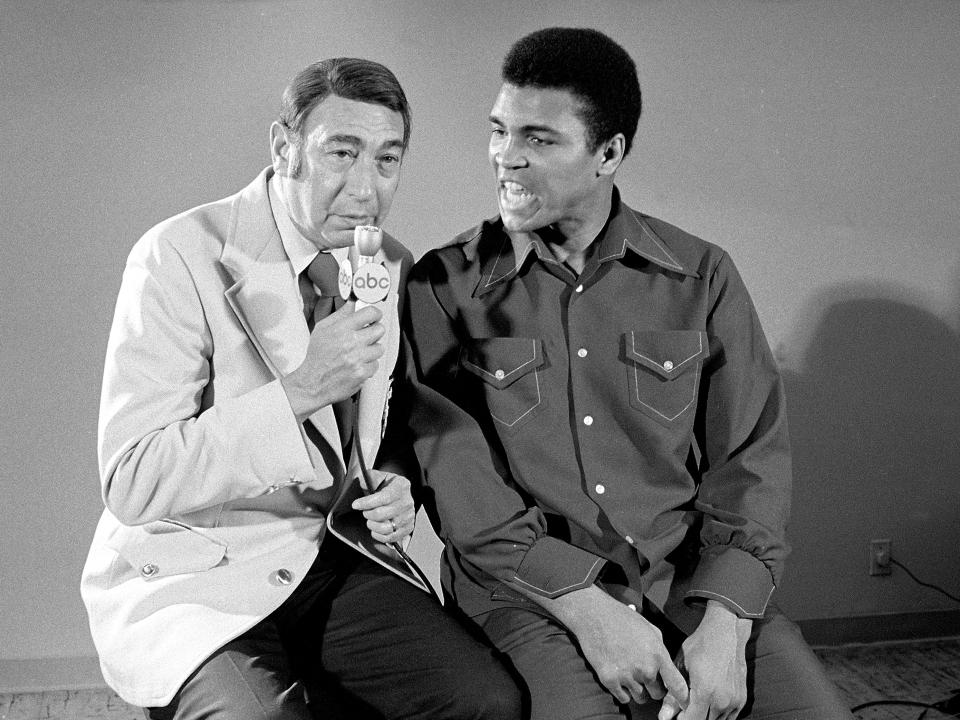 Muhammad Ali with ABC Sports announcer Howard Cosell during an interview at Caesars Palace Hotel. Las Vegas, Nevada 2/14/1973 (Image # 2021 )