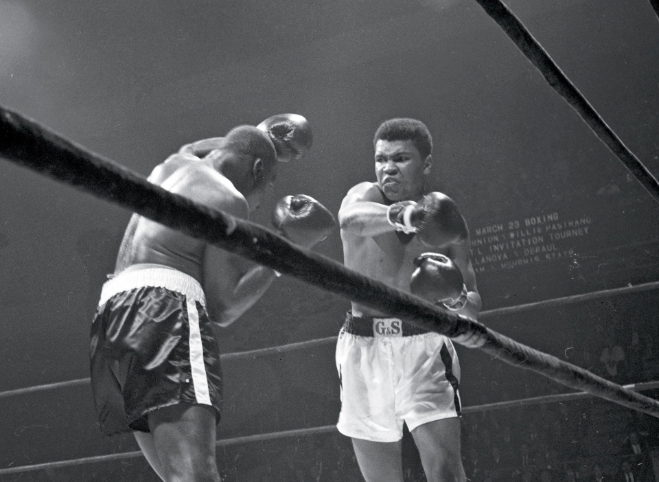 Muhammad Ali (Cassius Clay) slugs away at Doug Jones. (CLICK PHOTO TO VIEW VIDEO OF FIGHT)