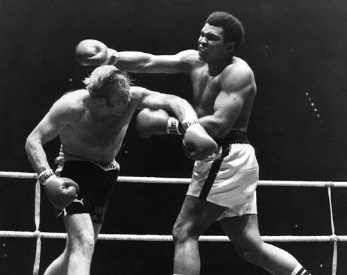Muhammad Ali Richard Dunn slugs it out with Muhammad Ali. (CLICK PHOTO TO VIEW VIDEO)