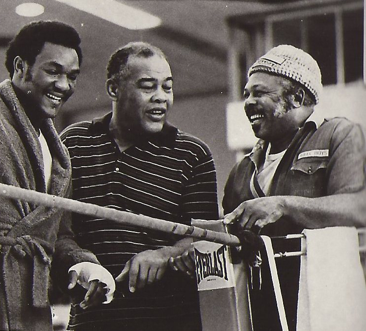 George Foreman (L) with Joe Louis (C), and Archie Moore (R).