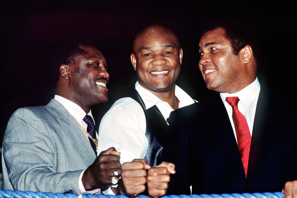 Joe Frazier, George Foreman and Muhammad Ali.