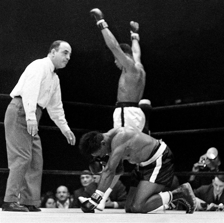 Cassius Clay finishes off Charlie Powell in Round 3.