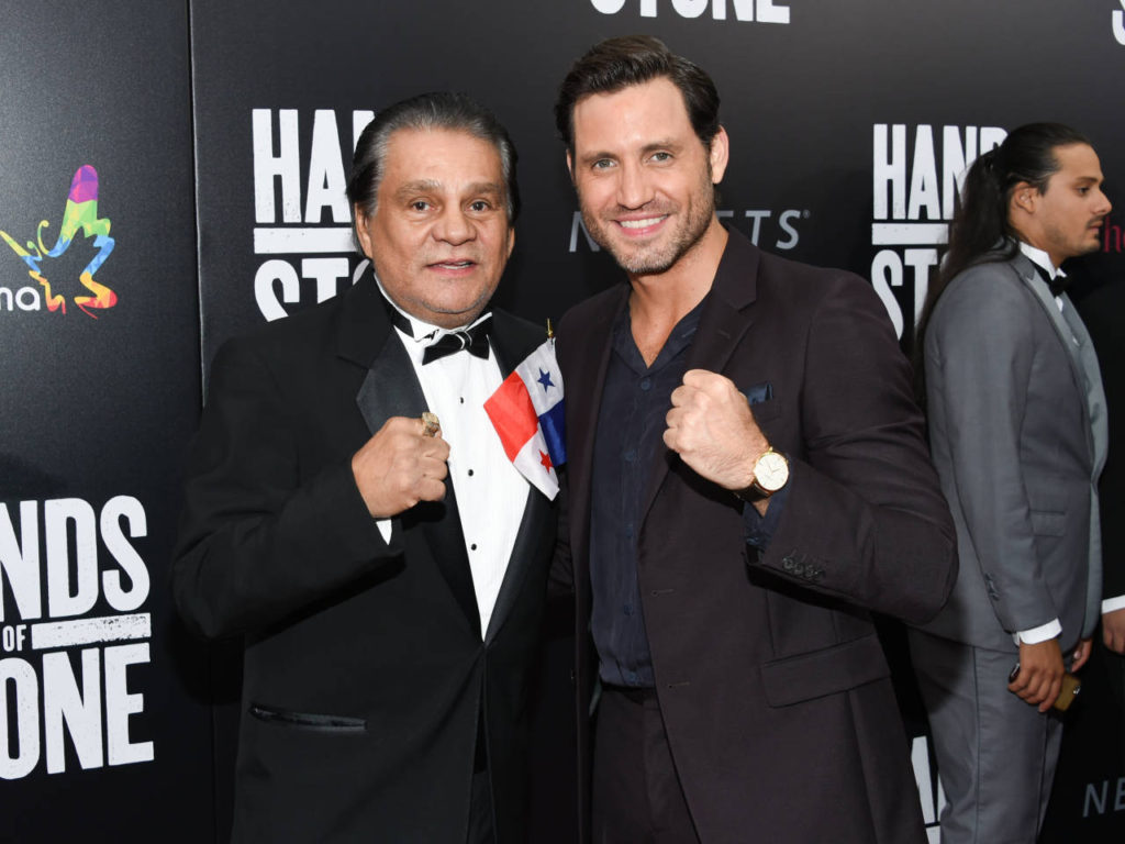 Former professional boxer Roberto Duran, left, and actor Edgar Ramirez, who plays Duran in the film, pose together at the U.S. premiere of "Hands of Stone" at the SVA Theatre on Monday, Aug. 22, 2016, in New York. (Photo by Evan Agostini/Invision/AP)