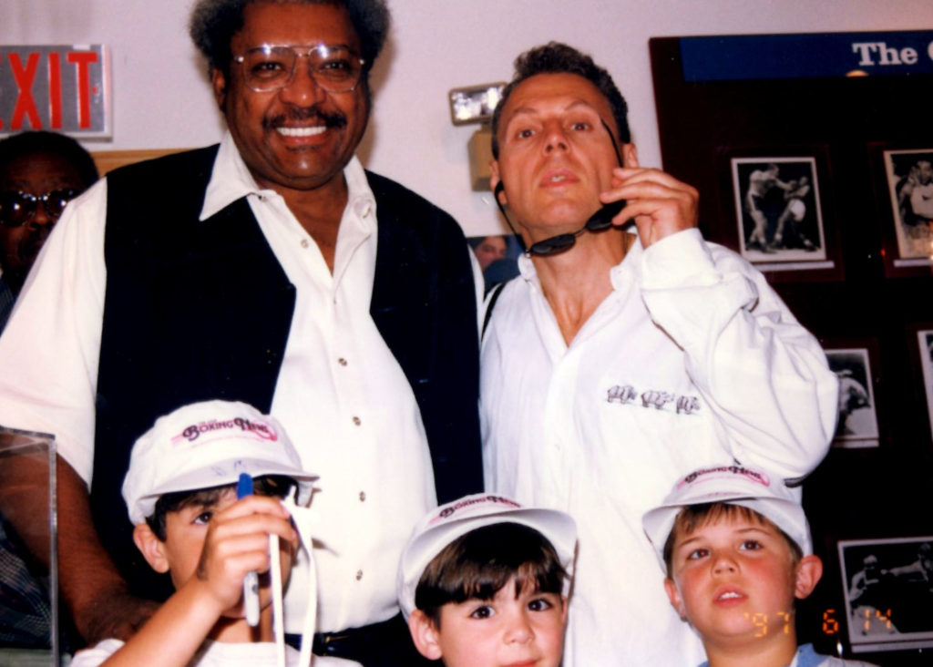 Promoter Don King with Joseph Rinaldi (bottom left) and Ron John Rinaldi (bottom right) at the International Boxing Hall of Fame. PHOTO BY ALEX RINALDI.