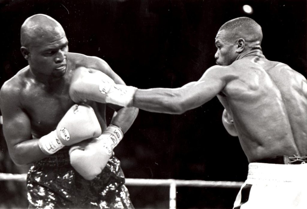 Roy Jones Jr. (R) connecting with a jab to James Toney's jaw in their November 18, 1994 bout in Washington DC. for the IBF middleweight title (PHOTO BY ALEX RINALDI)