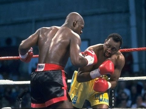 Barkley (L) trading leather with Tommy Hearns in their second fight.