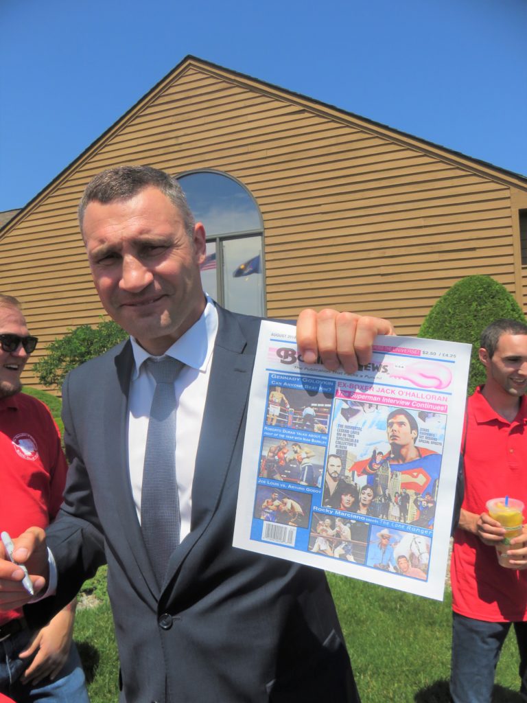 Former Heavyweight Champion and ring great Vitali Klitschko holding The USA Boxing News