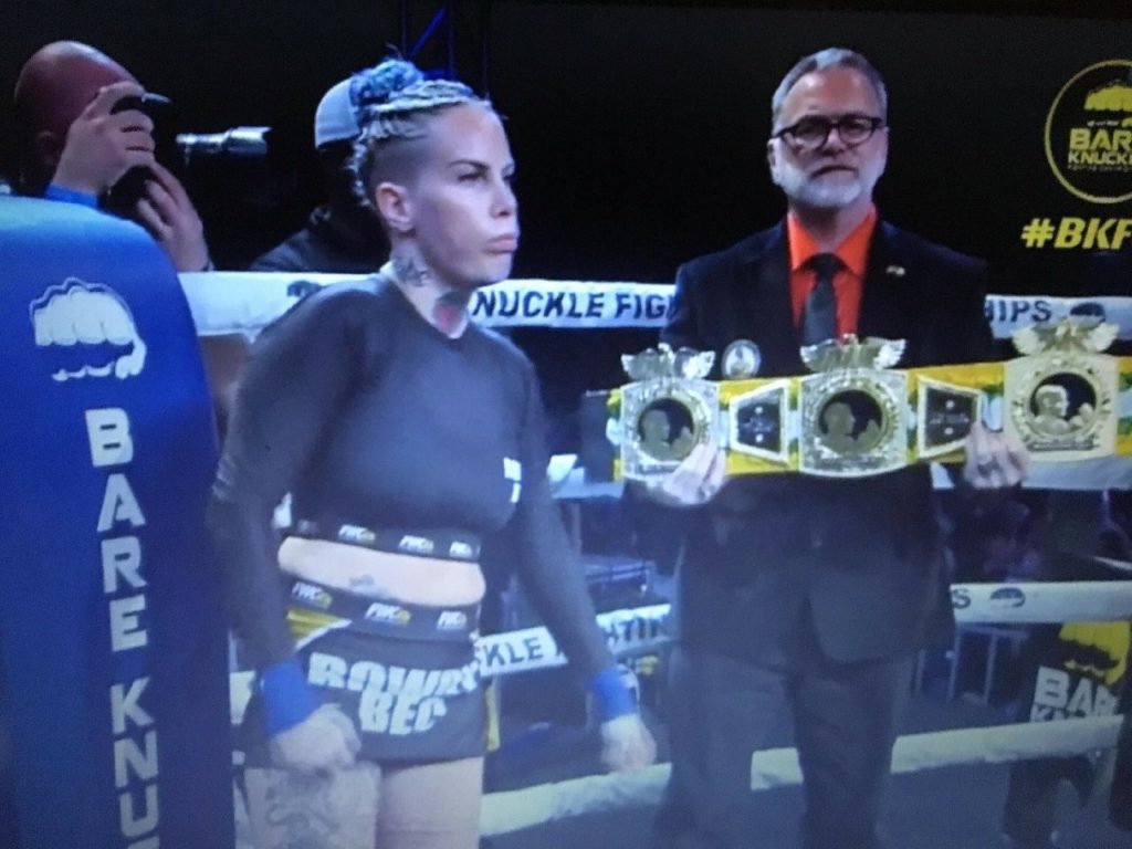 Moments before the bell to start Round 1 her her title defense, Champion Bec Rawlings and Police Gazette President Scott Burt are introduced.