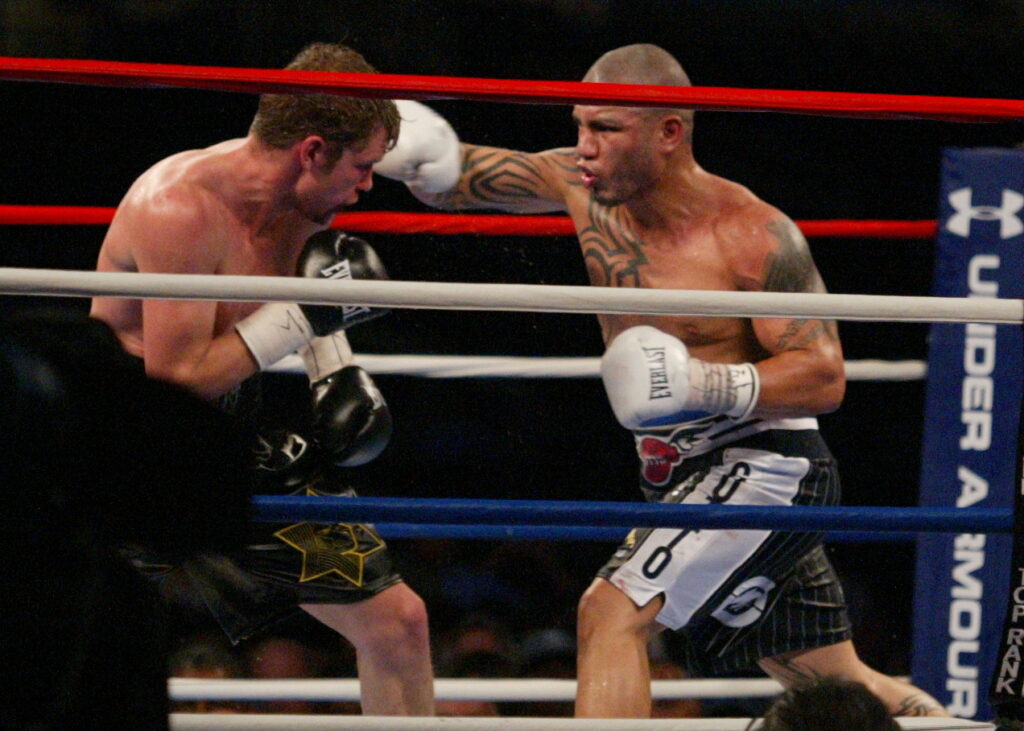 Miguel Cotto (R) landing a right against reigning WBO Super Welterweight Champion Yuri Foreman at New York's Yankee Stadium where Cotto won by KO on June 5, 2010.