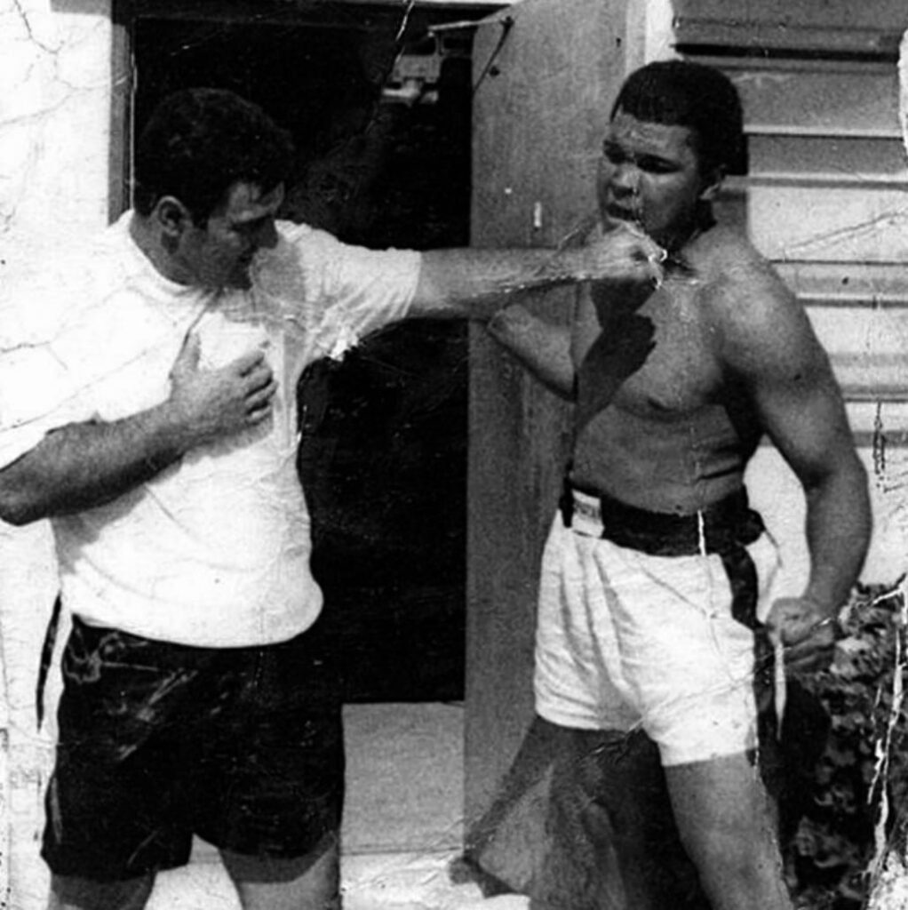 Former Heavyweight Champion Rocky Marciano with Muhammad Ali.