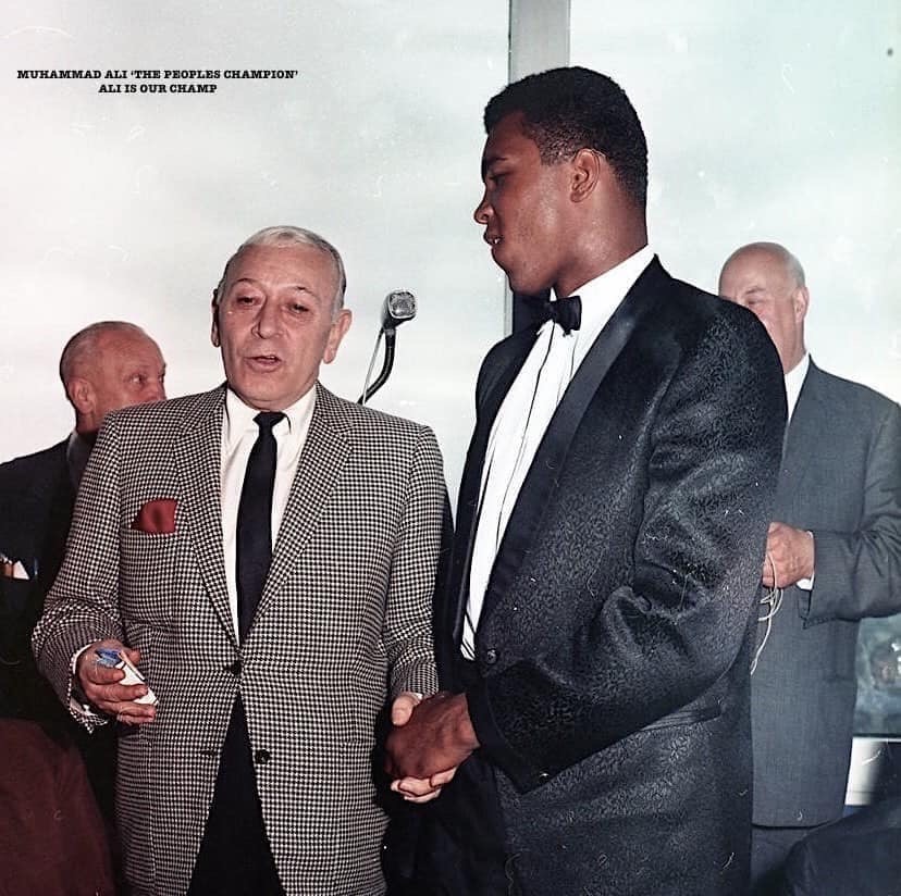 Actor George Raft and Heavyweight champion Muhammad Ali in England in 1966. for the Muhammad Ali vs. Brian London fight. The match took place at Earls Court Arena, London, England on August 6, 1966. It was scheduled for fifteen rounds. The match ended in the third round with Ali defeating London by KO.
