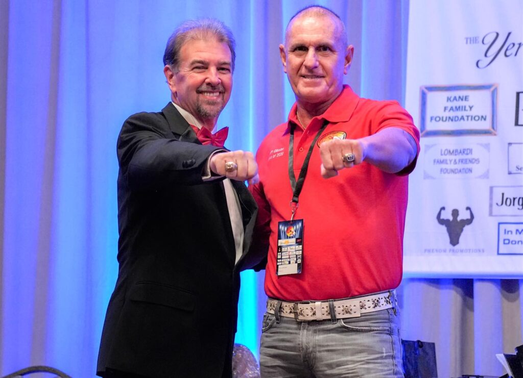 L-R FLBHOF Announcer Bob Alexander with 2020 Inductee Jeff Gibson.