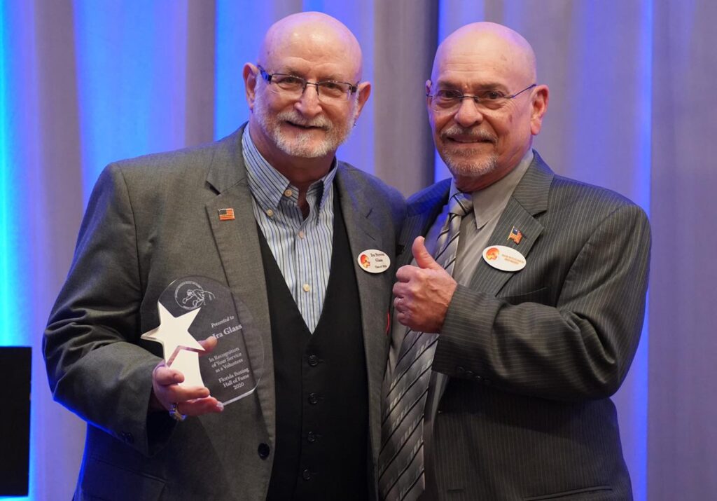 L-R Referee Emilio Lombardo Jr. and FLBHOF President Butch Flansburg.