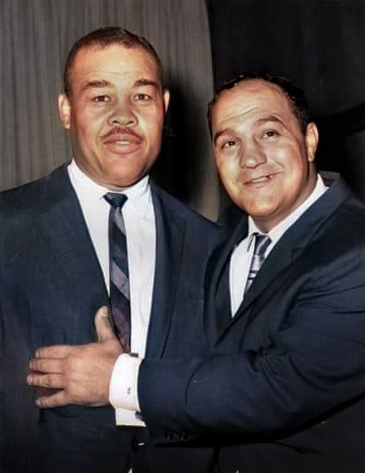 Joe Louis L) and Rocky Marciano R) in the 1960s.