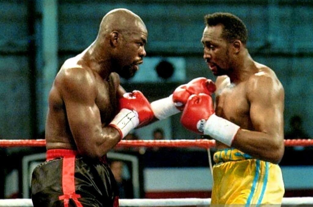 Iran Barkley (L) scores a split decision win 12 over Tommy "Hitman" Hearns (R) on March 20, 1992 at Caesars Palace, Paradise, Nevada, U.S. to capture the WBA light heavyweight title. (PHOTO BY ALEX RINALDI)