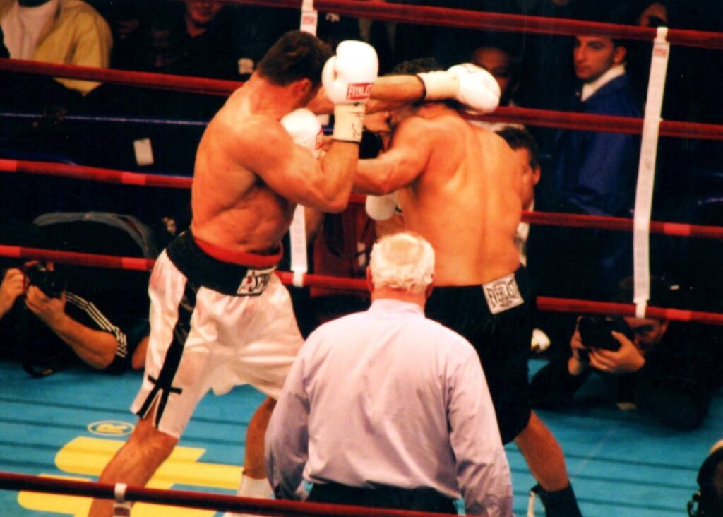 John Ruiz (R) in black trunks defeats Poland's Andrew Golota by UD12 on November 13, 2004at Madison Square Garden, New York City, New York, and retained WBA heavyweight title. (PHOTO BY ALEX RINALDI)