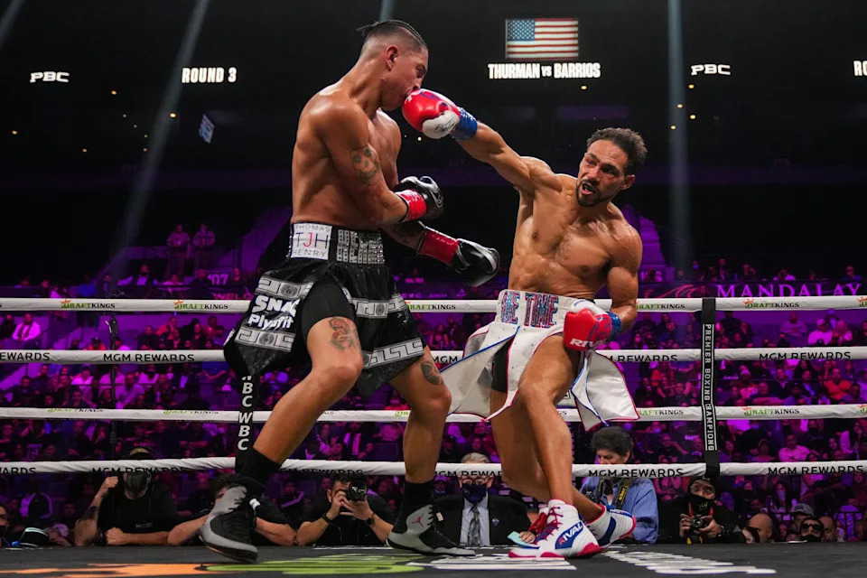 Thurman (R) lands a hard right to the chin of Barrios (L).
