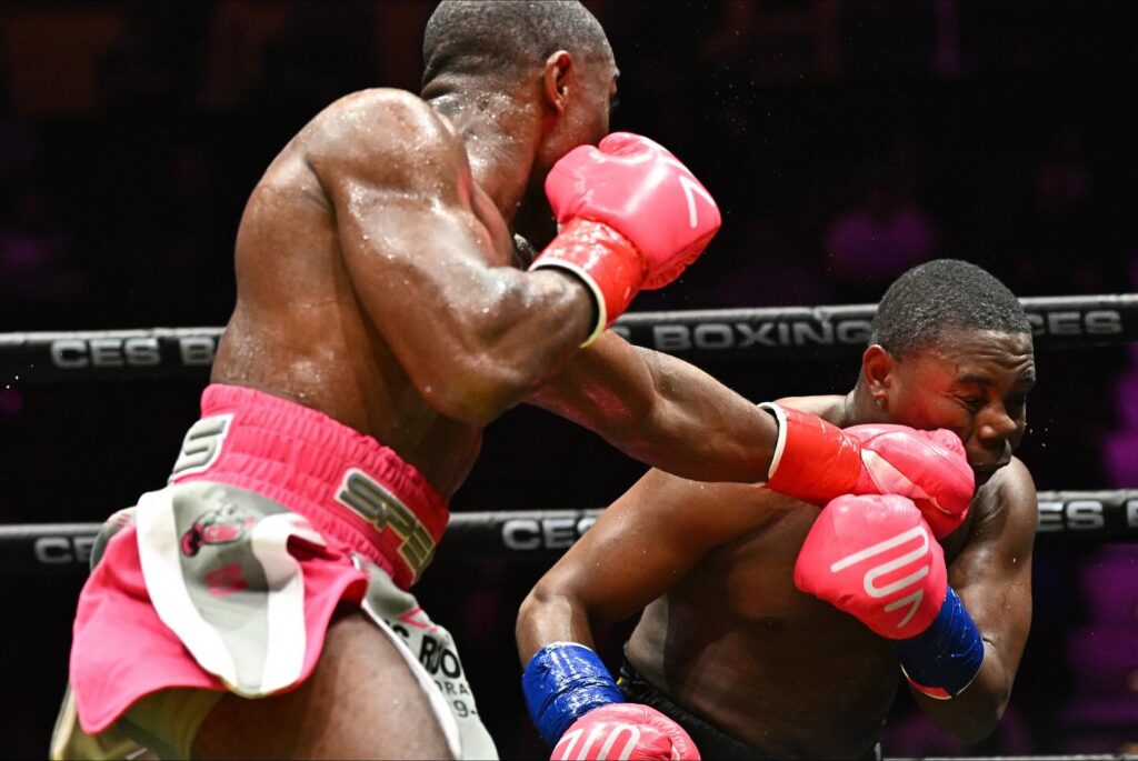 Rashidi Ellis lands a jab against Javier Fortuna (photo by Will Paul CES)