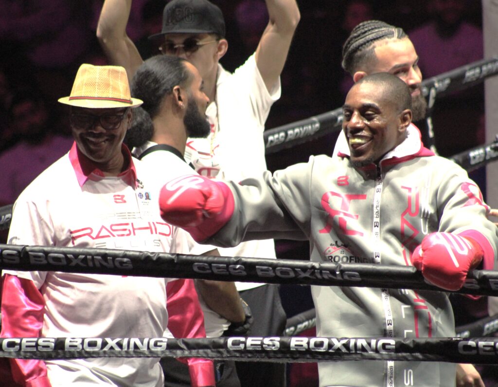 Rahsidi with his father Ronald Sr. after the bout._