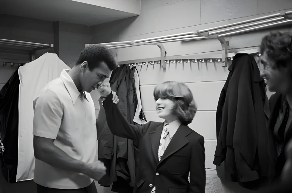 John F. Kennedy Jr. hanging out with Muhammad Ali after his 1974 fight with Joe Frazier at Madison Square Garden in New York.