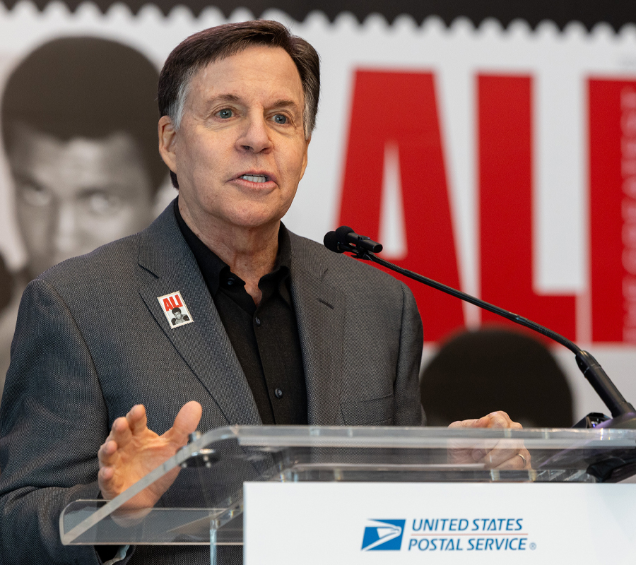 Announcer Bob Costa at the unveiling of the Ali Stamp
