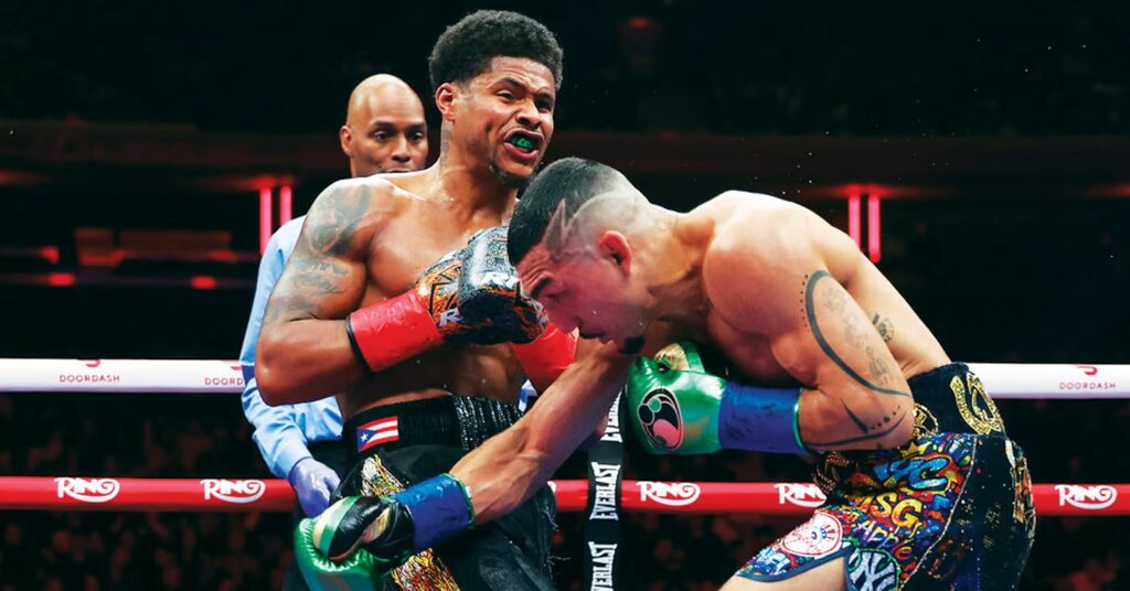 Stevenson (L) banging away Lopez (R).