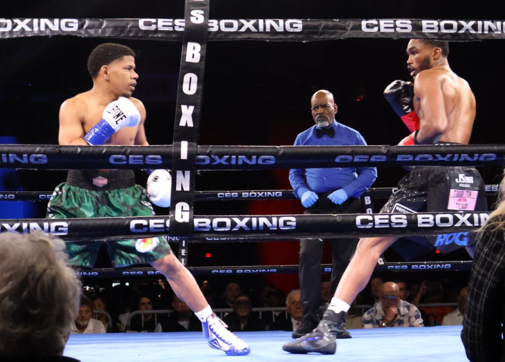 Iman Lee at right readies to attack Jose Nunez Sosa