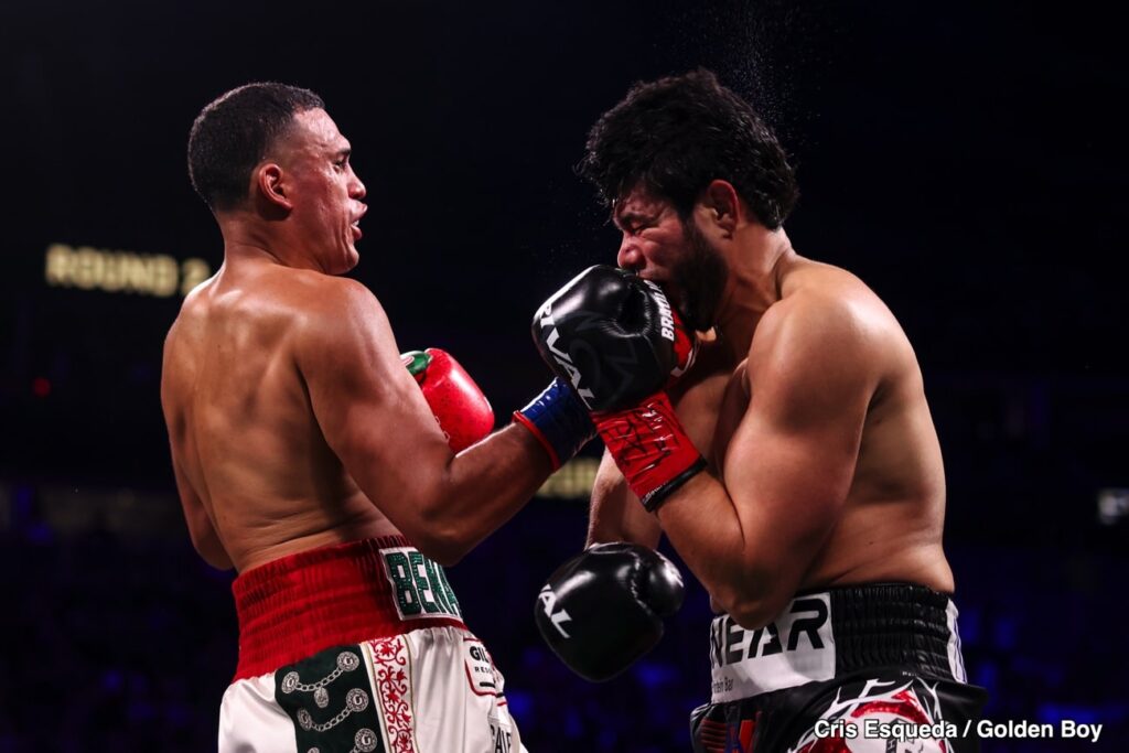 Benavides (L) landing a hard uppercut to Zurko's jaw.