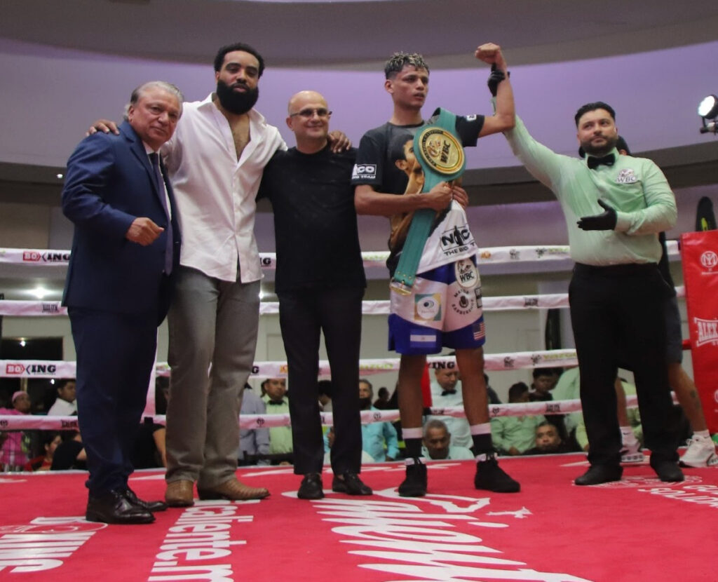Team Guerrero CelebratesNilo Guererro (center) successfully defended his WBC FECARBOX super featherweight title