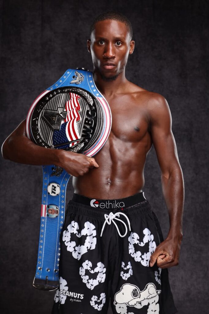 Bruce Carrington wearing the WBC custom Independence Championship Belt.